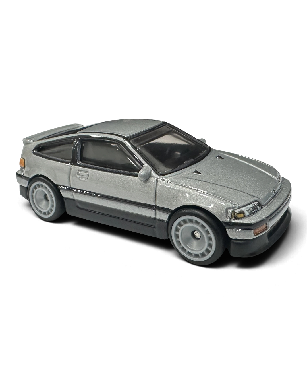 VaultifyUK Hot Wheels 1:64 scale silver 1988 Honda CR-X diecast car with aero disc wheels and metal body.