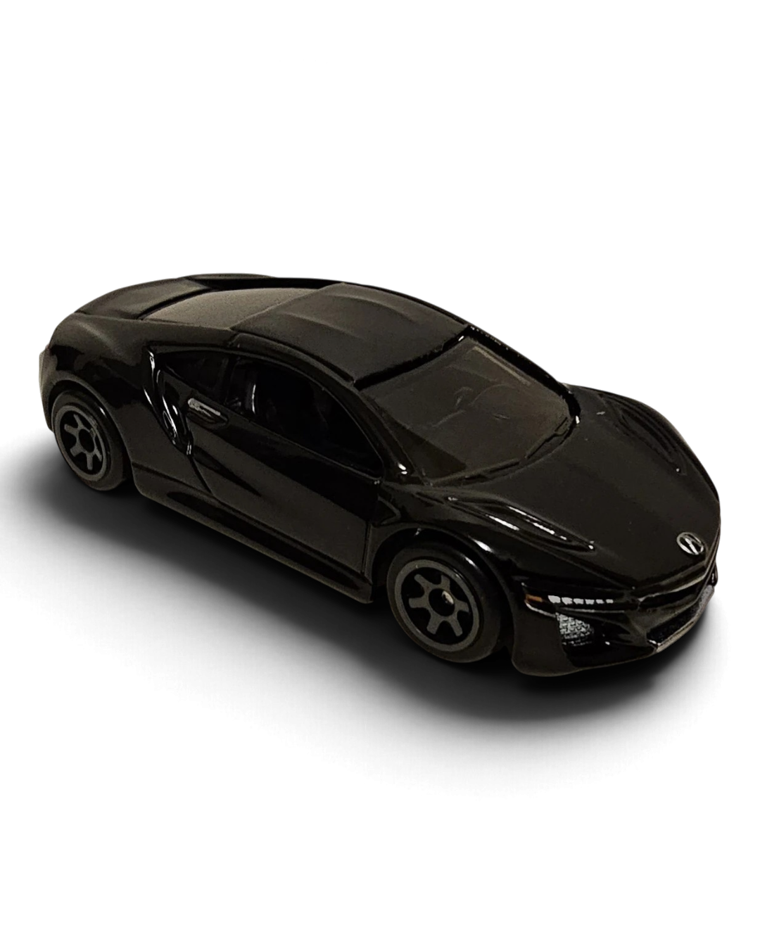 VaultifyUK Hot Wheels 17 Acura NSX die-cast car in glossy black with grey six-spoke wheels, 1:64 scale model.