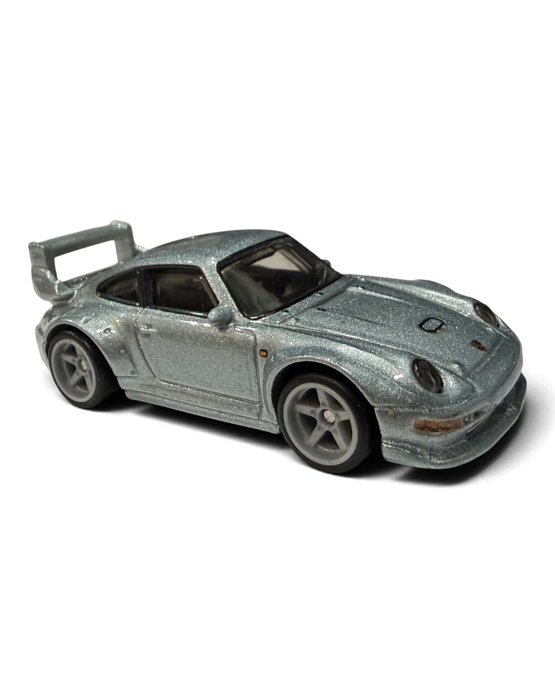 VaultifyUK Hot Wheels Premium Porsche 993 GT2 die-cast car in metallic silver with rear wing and Real Riders tires.