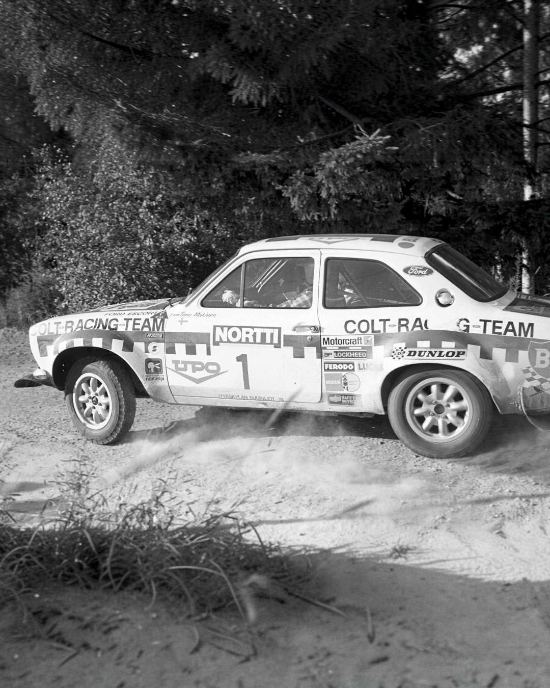 VaultifyUK 1:18 scale IXO Ford Escort Mk1 RS1600 rally car model with Colt Racing Team livery and rally decals