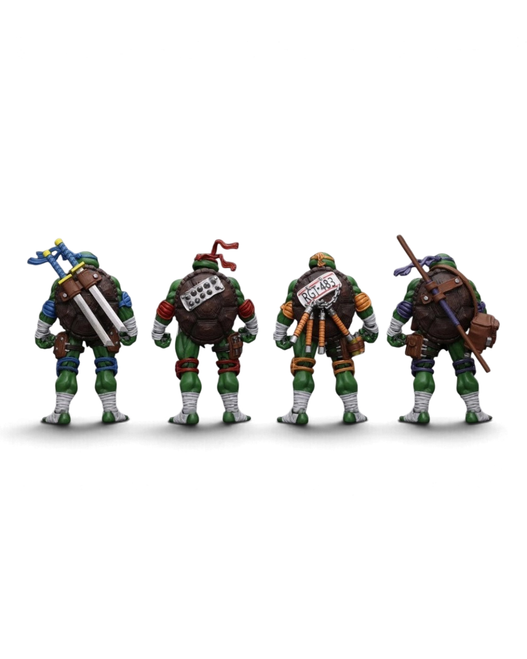 VaultifyUK JoyToy TMNT action figure set showing the back view of Leonardo, Raphael, Michelangelo, and Donatello.