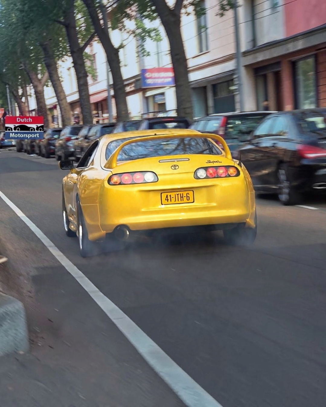 VaultifyUK LCD Models 1:64 yellow Toyota Supra A80 diecast car with rear spoiler and detailed taillights