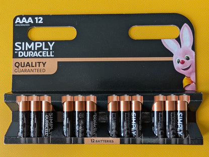 Pack of Duracell AAA batteries with a cartoon rabbit character on a yellow background