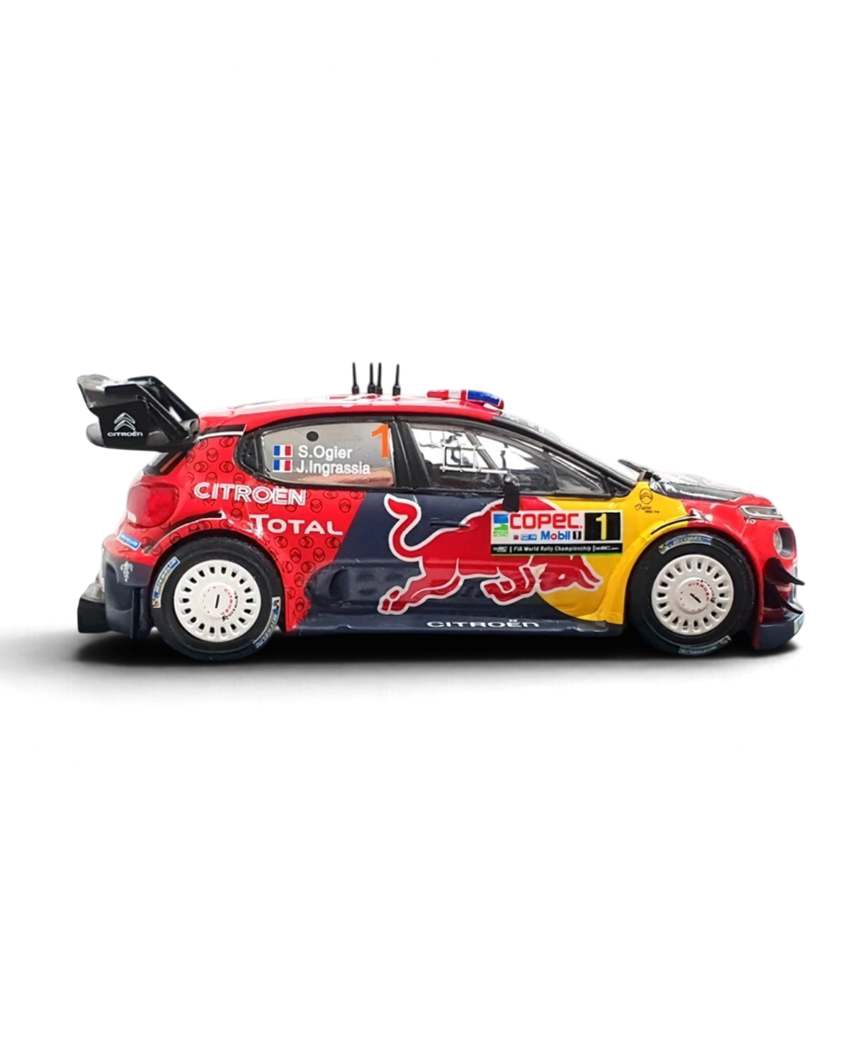VaultifyUK IXO 1:43 scale Citroën C3 WRC rally car model in red and blue Red Bull livery, driven by Sébastien Ogier.