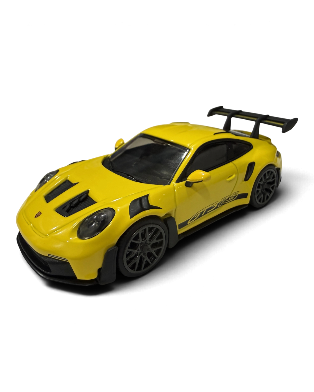 VaultifyUK Hot Wheels Premium Porsche 911 GT3 RS in racing yellow with black wing and detailed vented bonnet.