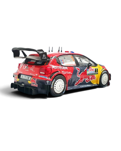 VaultifyUK 1:43 scale IXO Citroën C3 WRC rally car model, red and blue livery with Red Bull branding, rear view.
