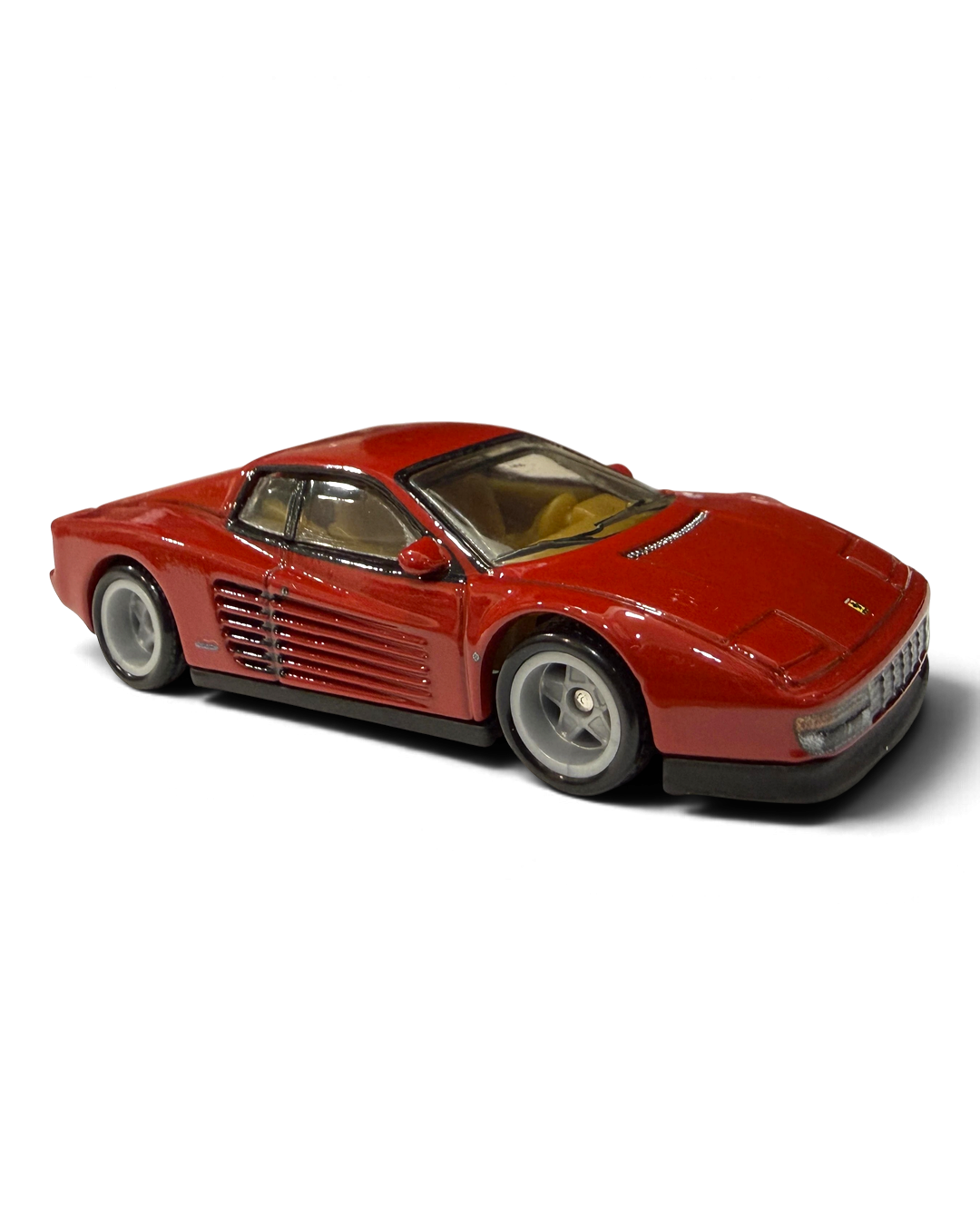 VaultifyUK Hot Wheels Premium Ferrari Testarossa in red with black side strakes and silver five-spoke wheels.