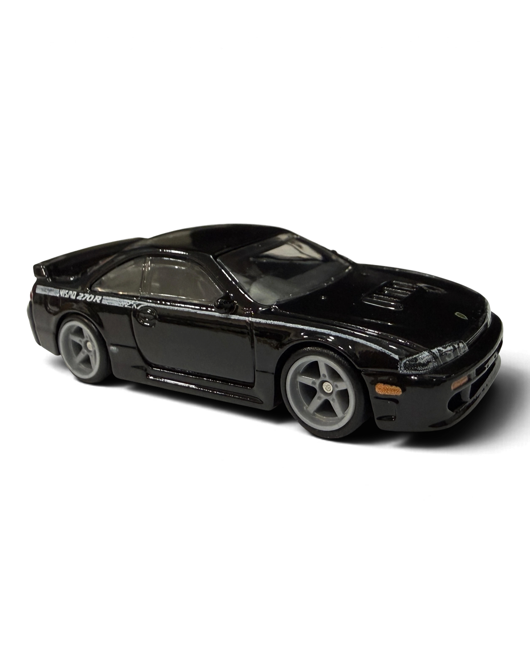 VaultifyUK Hot Wheels 1994 NISMO 270R S14 diecast car in black with white graphics and silver five-spoke wheels
