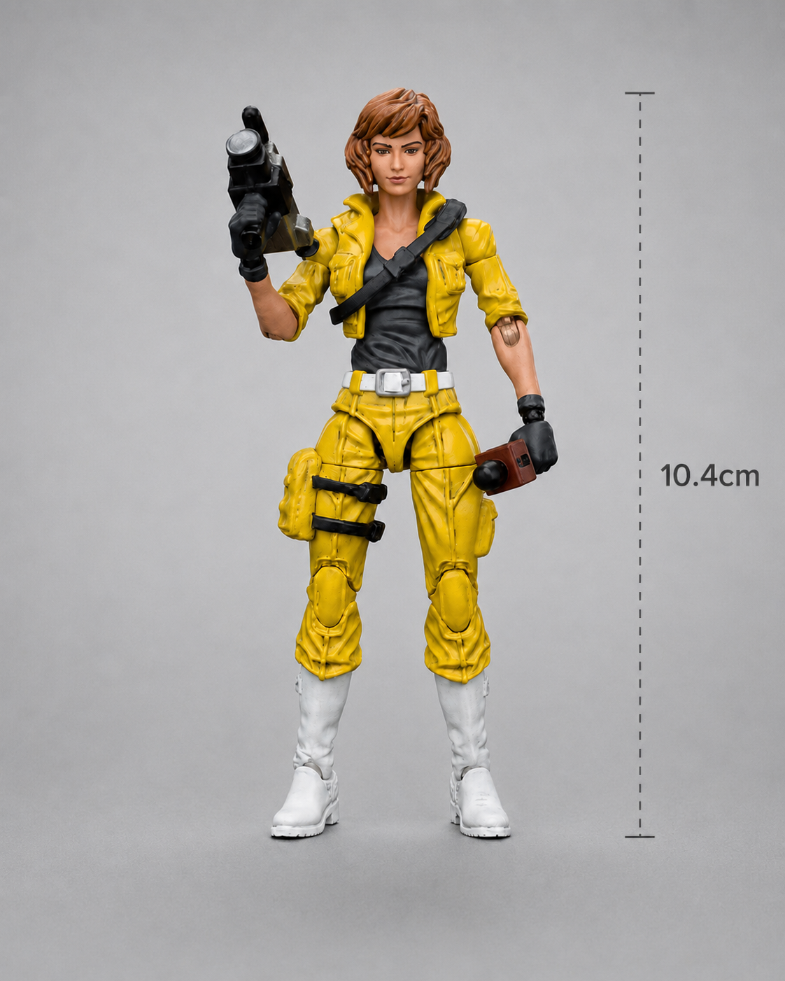 JoyToy Teenage Mutant Ninja Turtles April O’Neil action figure shown front-facing with camera accessories and a height guide indicating 10.4cm.