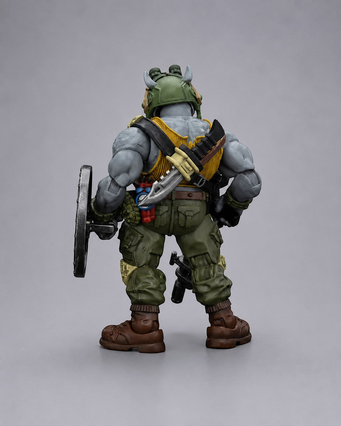 VaultifyUK JoyToy TMNT Rocksteady 1/18 scale action figure, back view showing rhino mutant details and gear.