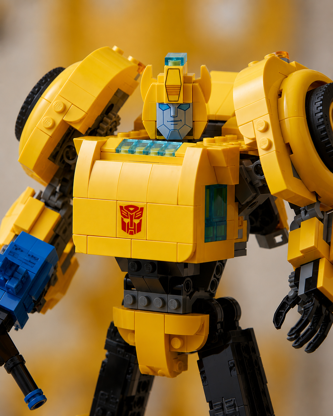 Close-up of LEGO Transformers Bumblebee showing Autobot insignia, face and detailed upper body
