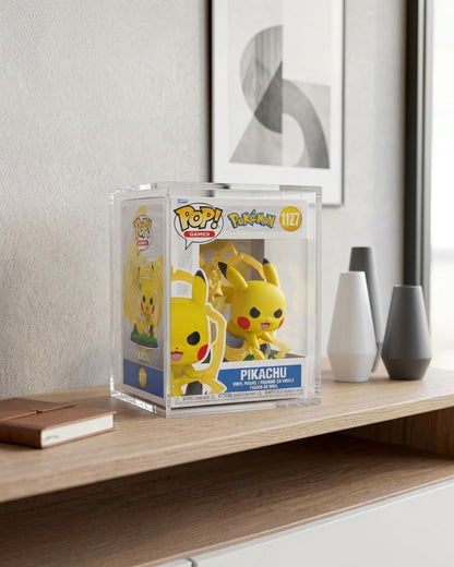 VaultifyUK premium acrylic display case protecting a Pikachu Funko Pop figure on a wooden shelf in a modern room