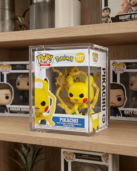 VaultifyUK crystal-clear acrylic display case protecting a Pikachu Funko Pop! Premium figure on a wooden shelf