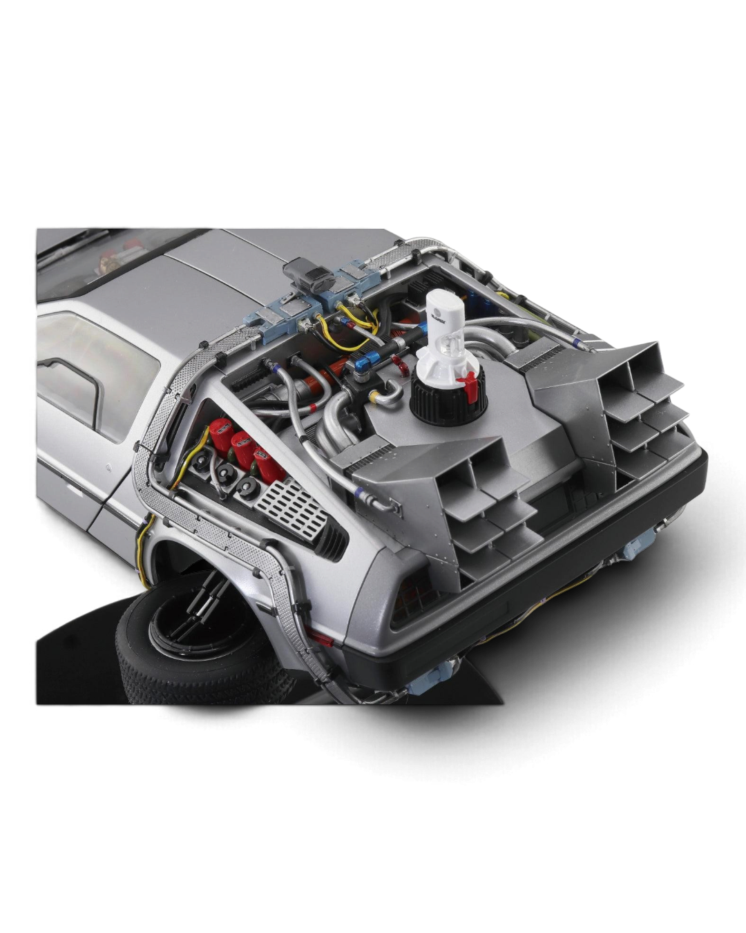 VaultifyUK Aoshima 1:24 scale DeLorean model kit showing detailed rear engine components and folded wheels for flight