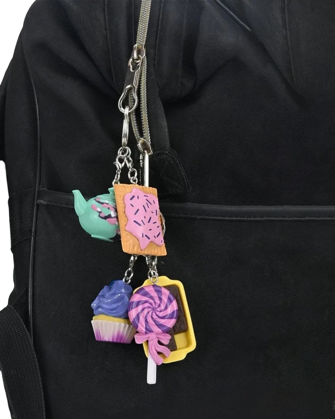VaultifyUK Critical Role Taste of Exandria food-themed charms hanging on a black backpack keyring