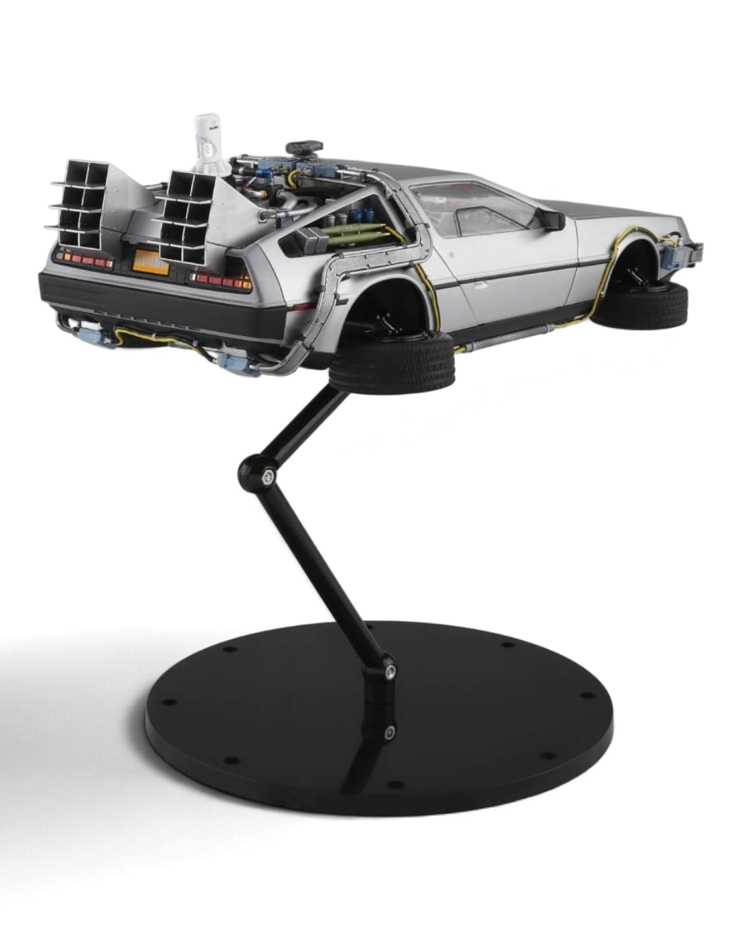 VaultifyUK Aoshima 1:24 scale DeLorean model kit from Back to the Future Part II in flying hover mode on display stand