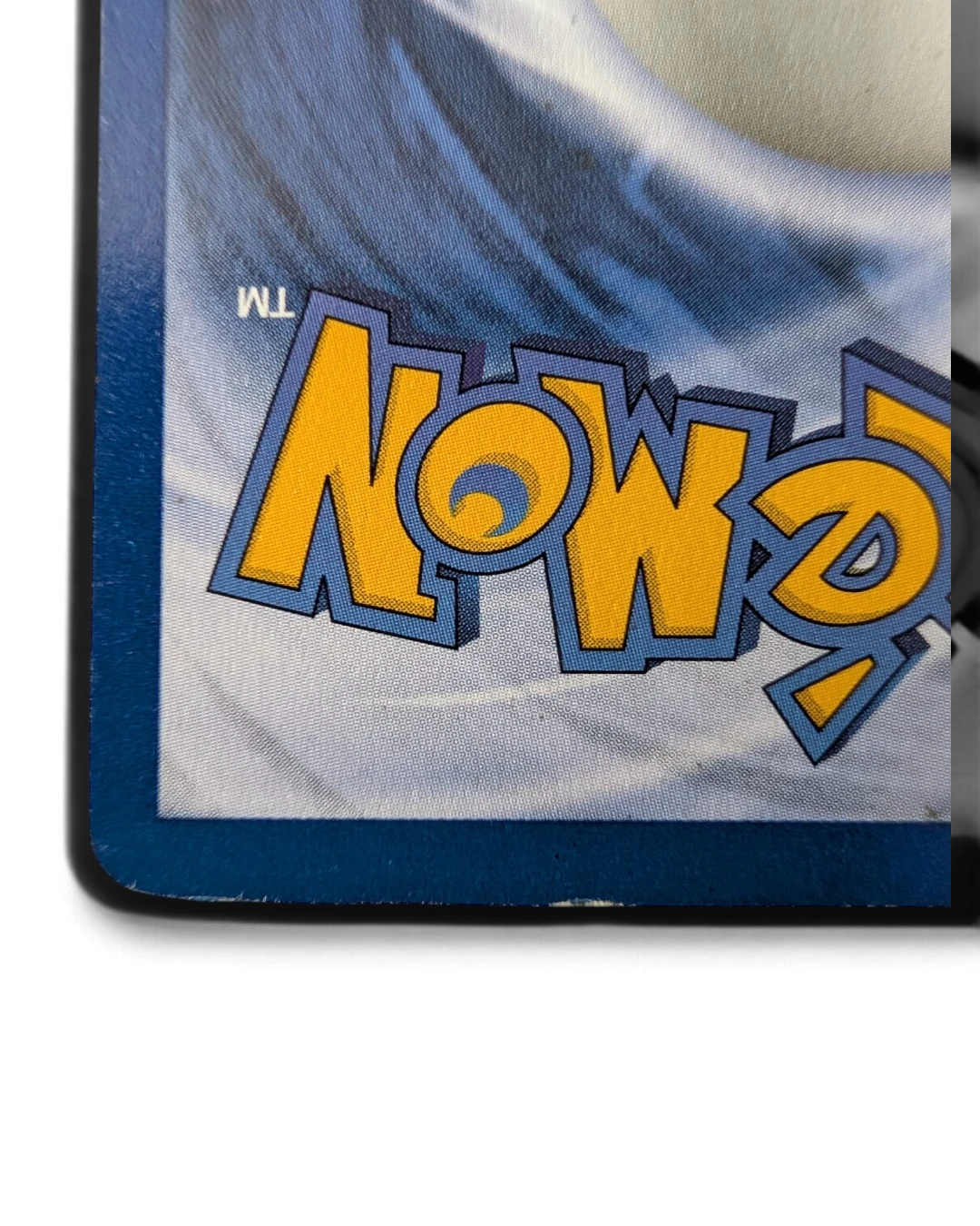 VaultifyUK Pokémon TCG Base Set Diglett card back showing corner wear on the blue card border