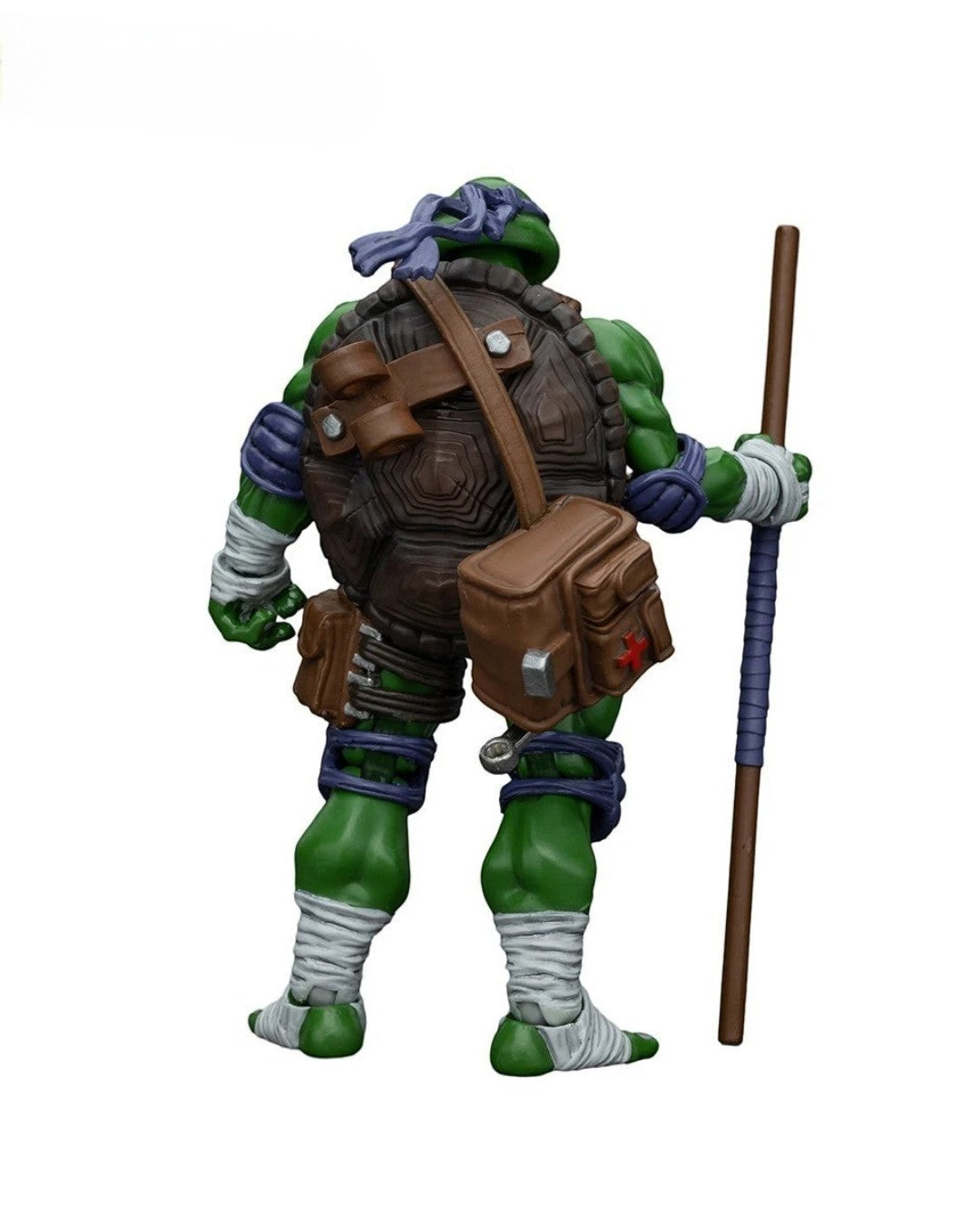 VaultifyUK Donatello 1/18 scale action figure from JoyToy TMNT, showing back view with bo staff and brown utility bag.
