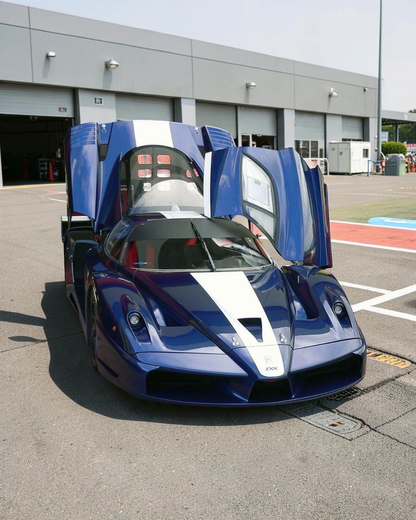 VaultifyUK Hot Wheels Elite 1:43 scale Ferrari FXX #24 diecast model car in blue and white livery with open doors