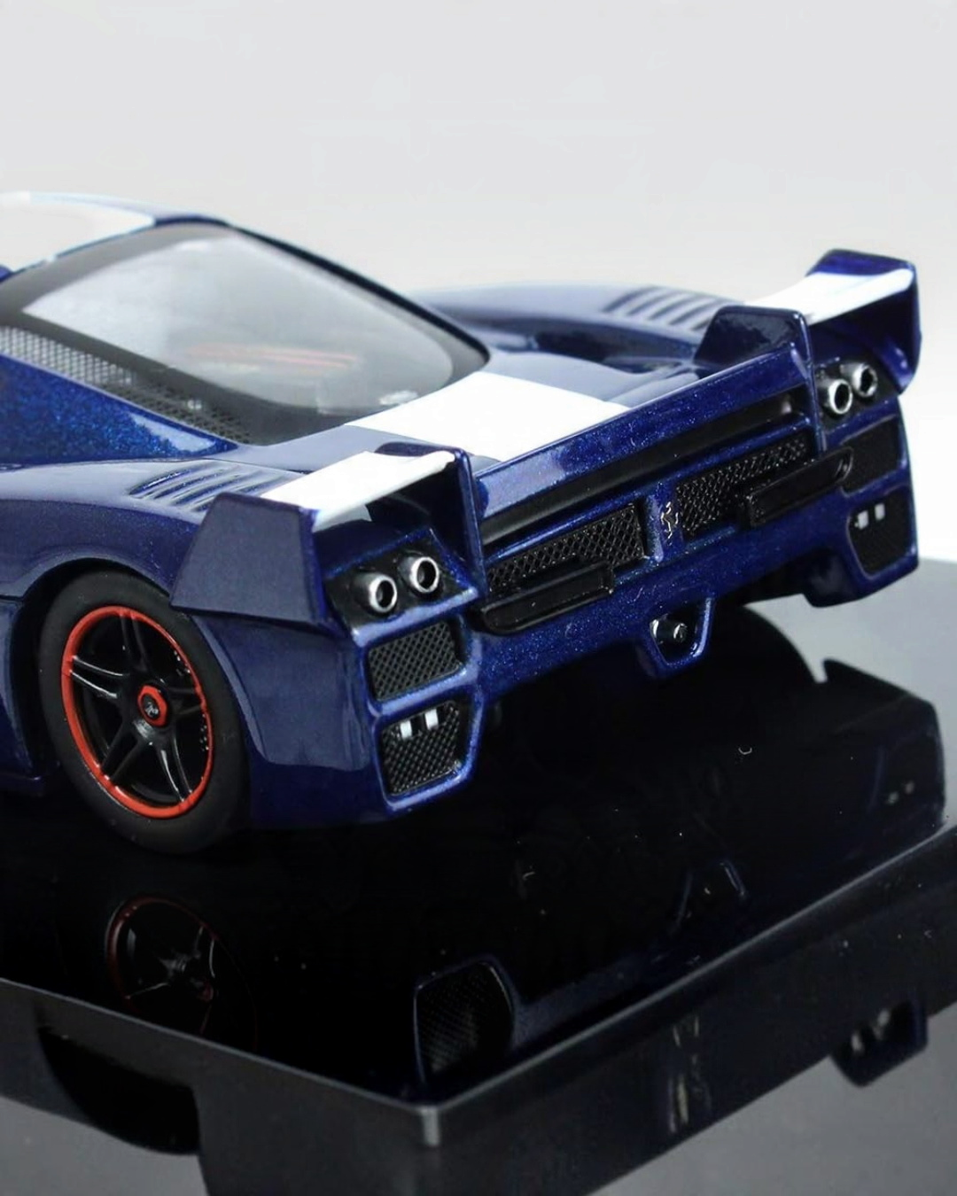 VaultifyUK Hot Wheels Elite 1:43 scale Ferrari FXX #24 diecast model car in blue and white with black wheels