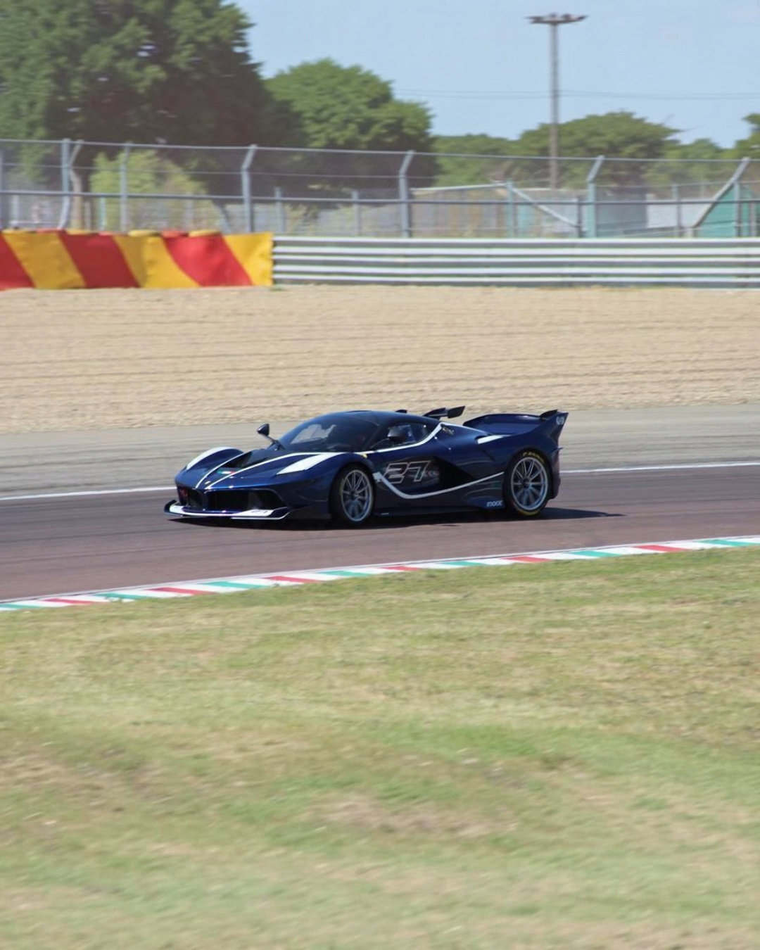 VaultifyUK Hot Wheels Elite 1:43 scale Ferrari FXX #24 diecast model car in a blue and white racing livery