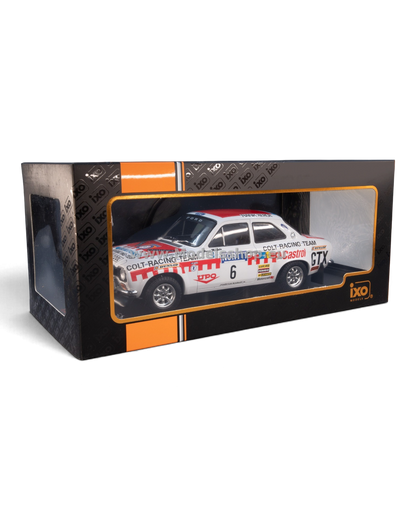 VaultifyUK 1:18 scale IXO Ford Escort Mk1 RS1600 rally car model in white with red racing livery and Castrol branding.