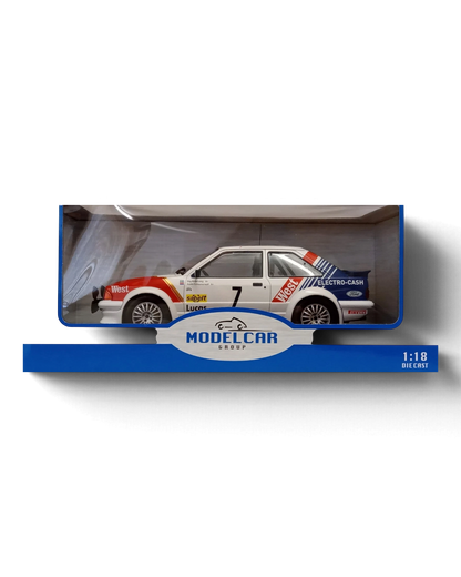VaultifyUK 1:18 scale MCG Ford Escort Mk3 RS Turbo rally car model with West livery in a display box