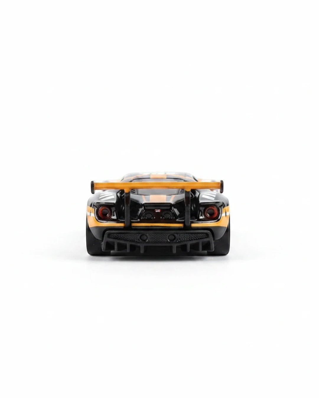 VaultifyUK Hot Wheels Premium Forza 2016 Ford GT Race die-cast car, rear view showing orange spoiler and black body.