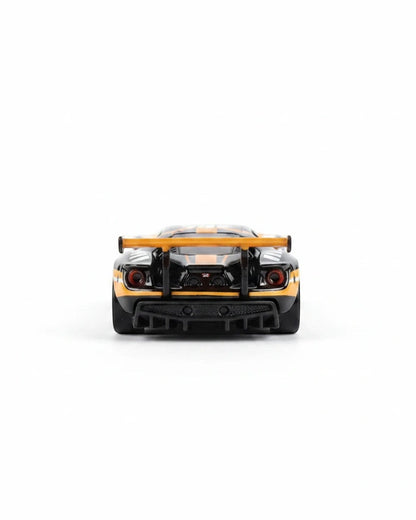 VaultifyUK Hot Wheels Premium Forza 2016 Ford GT Race die-cast car, rear view showing orange spoiler and black body.