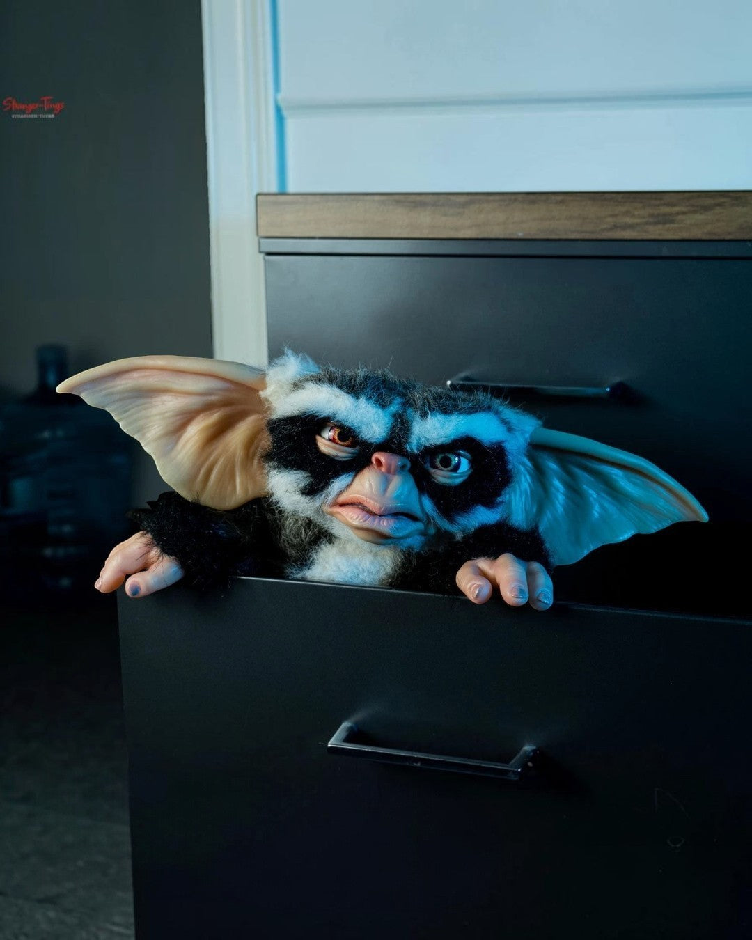 VaultifyUK 1:1 scale George Mogwai prop from Gremlins 2 with faux fur, oversized ears, and a scowling expression.