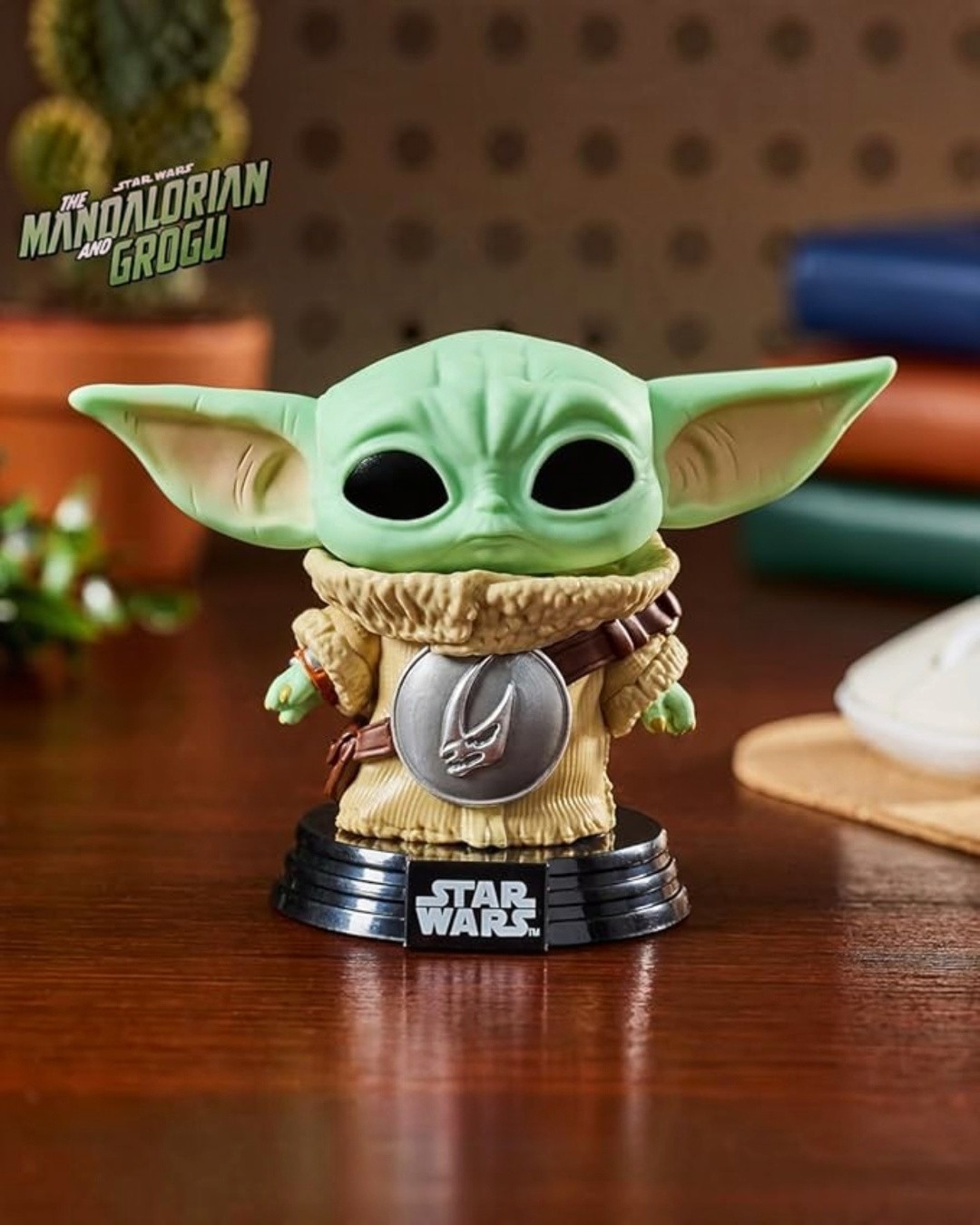 Funko Pop! #819 Grogu with Mudhorn crest, The Mandalorian and Grogu, on its Star Wars base