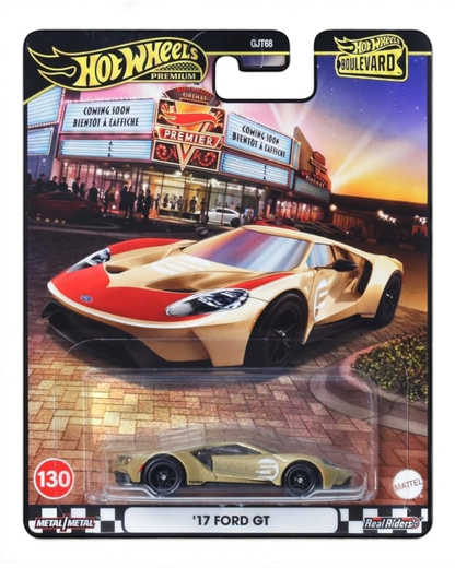VaultifyUK Hot Wheels Premium 17 Ford GT in gold with red accents, 1:64 scale die-cast car on blister card packaging.
