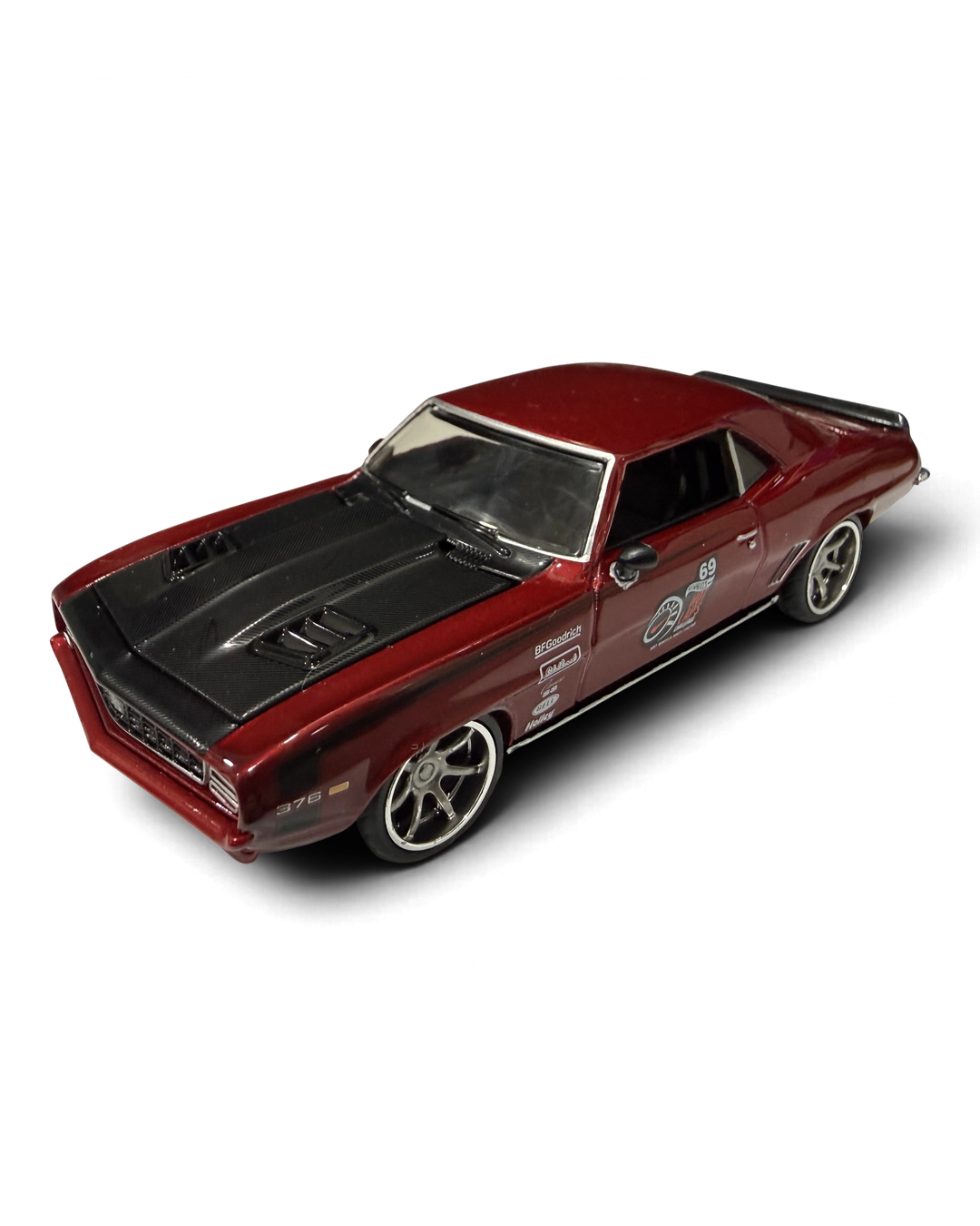 VaultifyUK Hot Wheels 1969 Camaro Pro Touring die-cast car in metallic red with matte black hood and silver wheels.