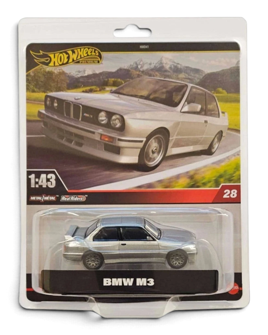 Hot Wheels Premium 1:43 modified widebody BMW M3 (E30) die-cast car in silver in its clamshell pack