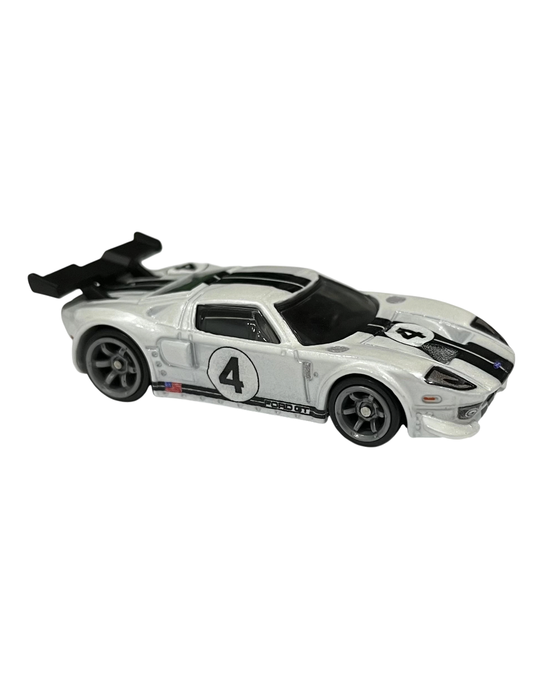 VaultifyUK Hot Wheels Premium Ford GT die-cast car in white with black racing stripes and number 4 livery