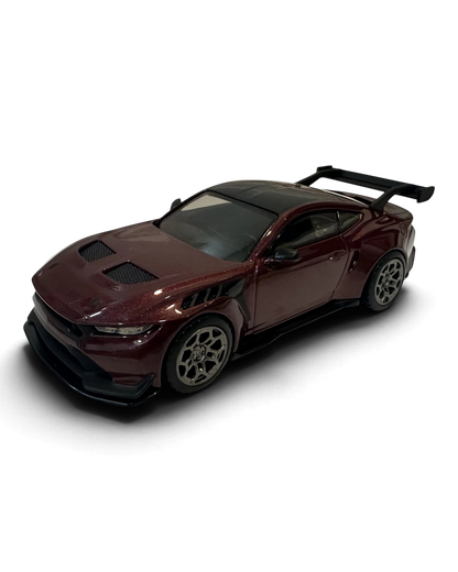 VaultifyUK Hot Wheels Premium 1:43 scale deep red Ford Mustang GTD diecast car with black carbon-look accents.