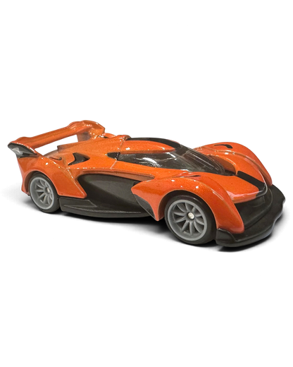 VaultifyUK Hot Wheels Premium McLaren Solus GT die-cast car in bright orange with silver wheels and black aero details.