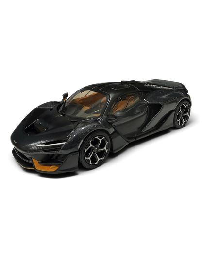 VaultifyUK Hot Wheels Premium 1:43 McLaren W1 die-cast hypercar in dark graphite with orange accents.