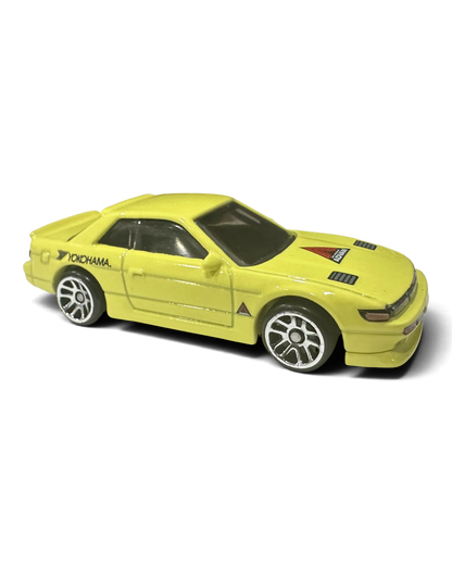 VaultifyUK Hot Wheels Nissan Silvia S13 die-cast car in pale yellow with Yokohama and Advan racing graphics