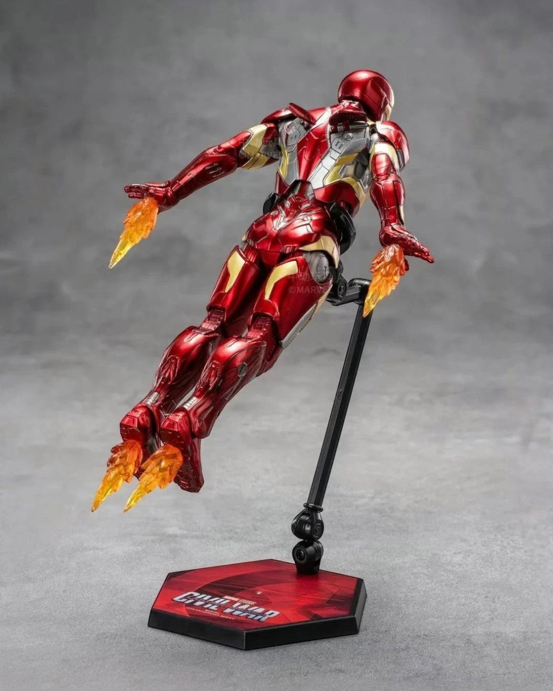 VaultifyUK ZD Toys Iron Man Mark 46 1/10 action figure in flight pose with translucent orange repulsor effect parts