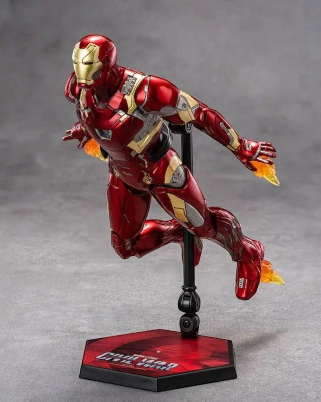 VaultifyUK ZD Toys Iron Man Mark 46 1/10 scale action figure in flight pose with flame effects on a display stand