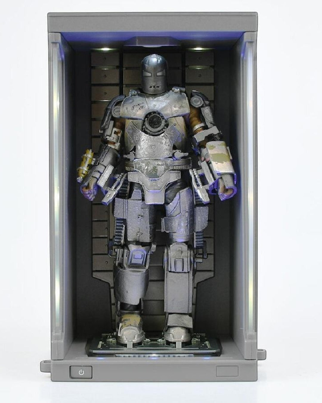 VaultifyUK ZD Toys Iron Man Mark I 1/10 scale figure in an illuminated grey Hall of Armor display case