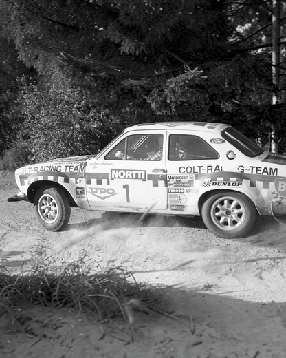 VaultifyUK 1:18 scale IXO Ford Escort Mk1 RS1600 rally car model with Colt Racing Team livery and rally decals