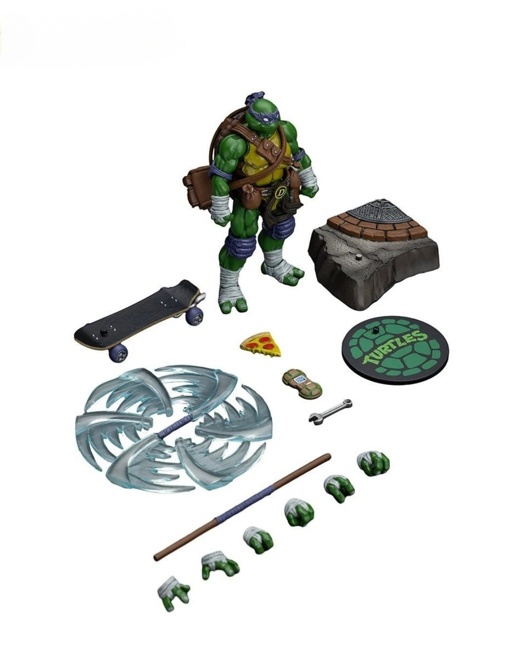 VaultifyUK JoyToy Donatello 1/18 scale action figure with bo staff, skateboard, pizza slice, and interchangeable hands.