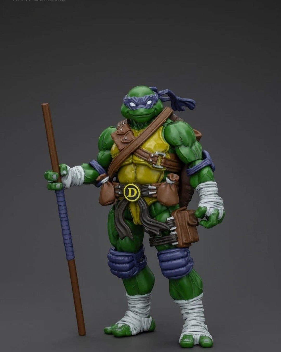 VaultifyUK JoyToy Donatello 1/18 scale action figure with purple mask, bo staff, and detailed tactical gear