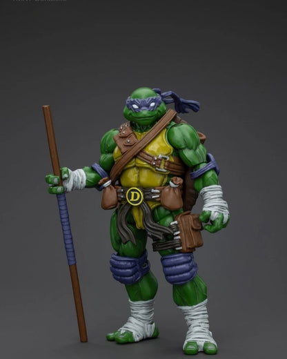 VaultifyUK JoyToy Donatello 1/18 scale action figure with purple mask, bo staff, and detailed tactical gear