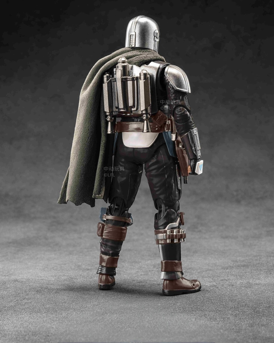 VaultifyUK ZD Toys 1/10 scale Mandalorian action figure seen from behind with detailed silver armor and fabric cape