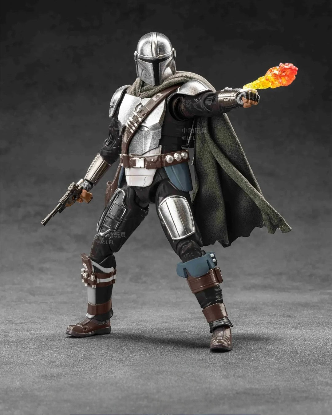 VaultifyUK ZD Toys 1/10 scale Mandalorian action figure with fabric cape, blaster, and flame effect accessory.