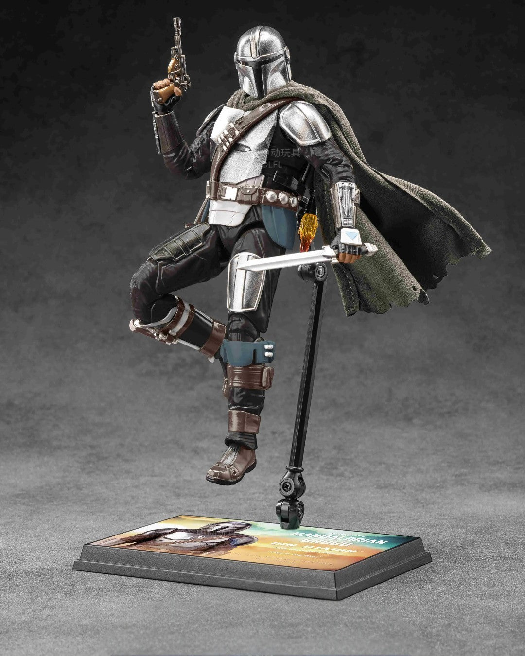 VaultifyUK ZD Toys 1/10 scale Mandalorian action figure with fabric cape, blaster, and blade in a dynamic pose