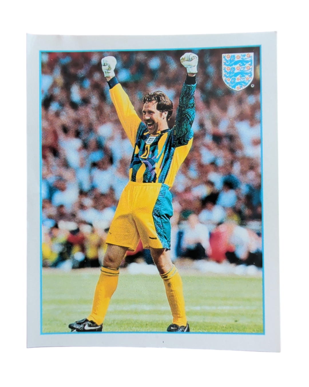 Merlin Premier League 97 England Poster sticker E, goalkeeper celebrating with arms raised.